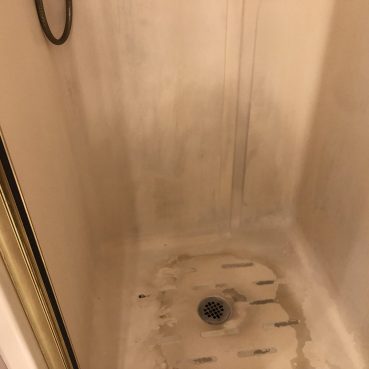 Our Crew Cleaning Bathroom Cleaning